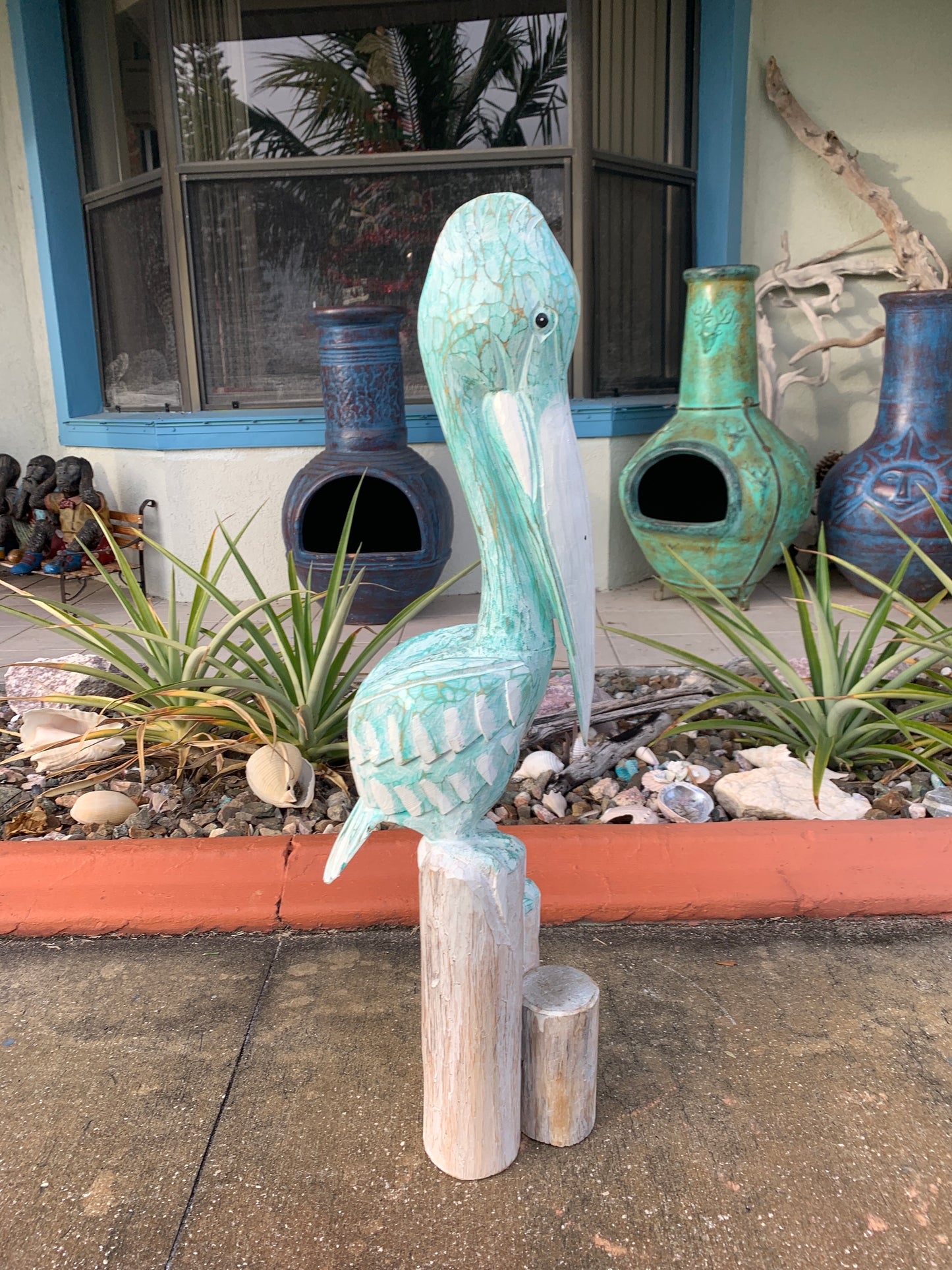 Carved Wooden Pelican Statue – Coastal Yard & Garden Decor