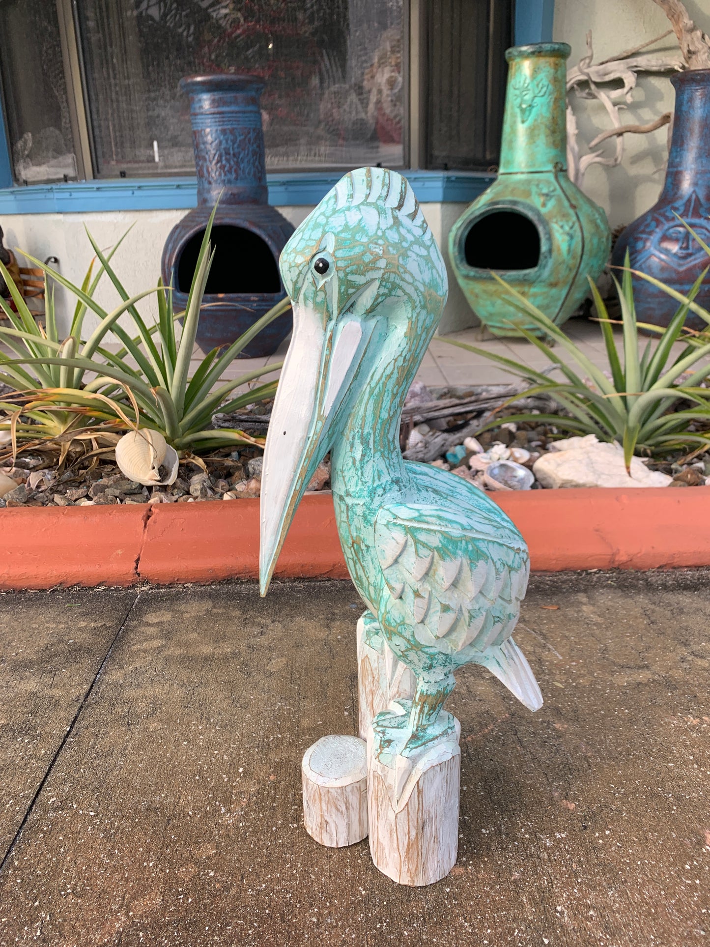 Carved Wooden Pelican Statue – Coastal Yard & Garden Decor
