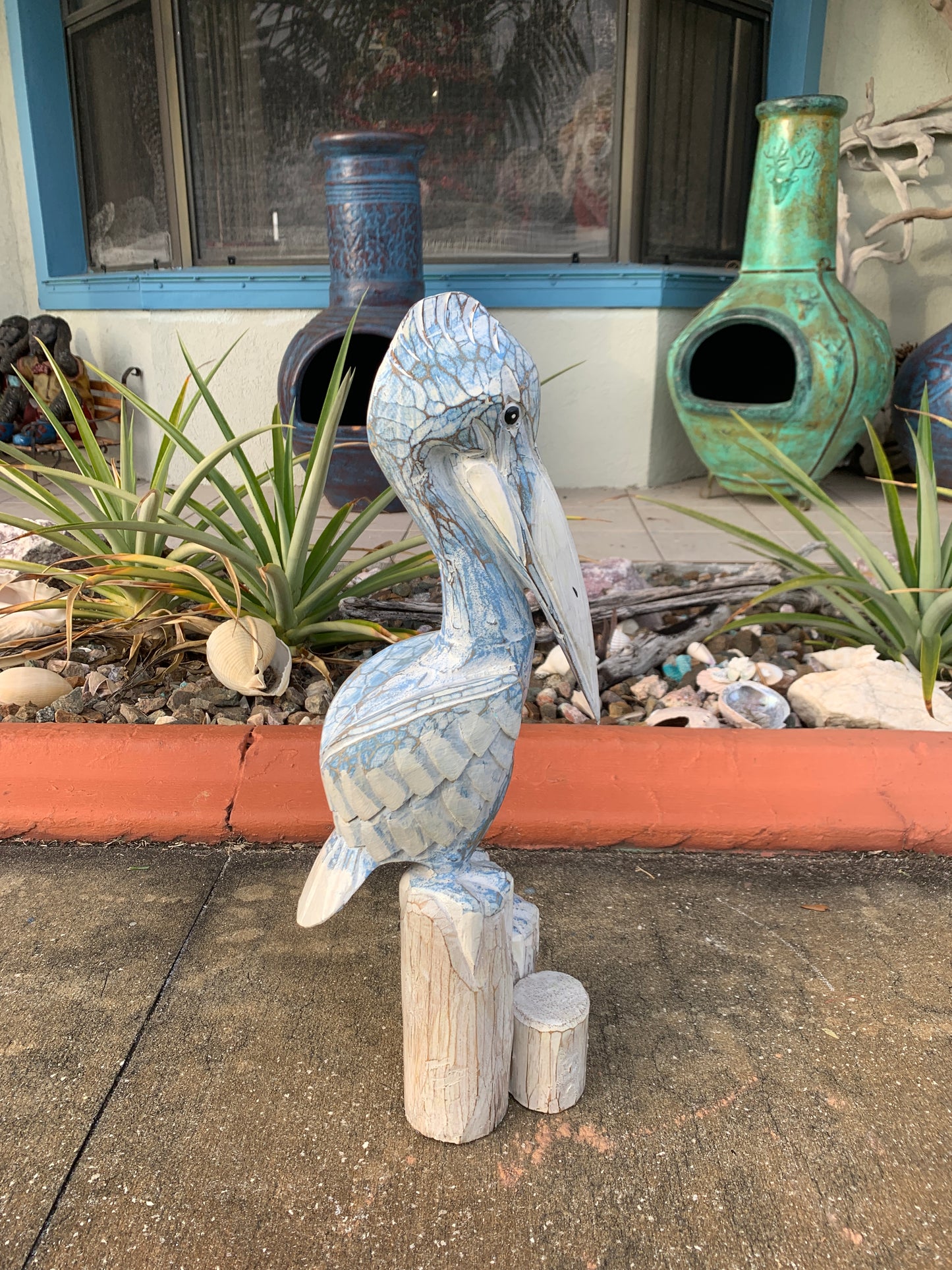 Carved Wooden Pelican Statue – Coastal Yard & Garden Decor