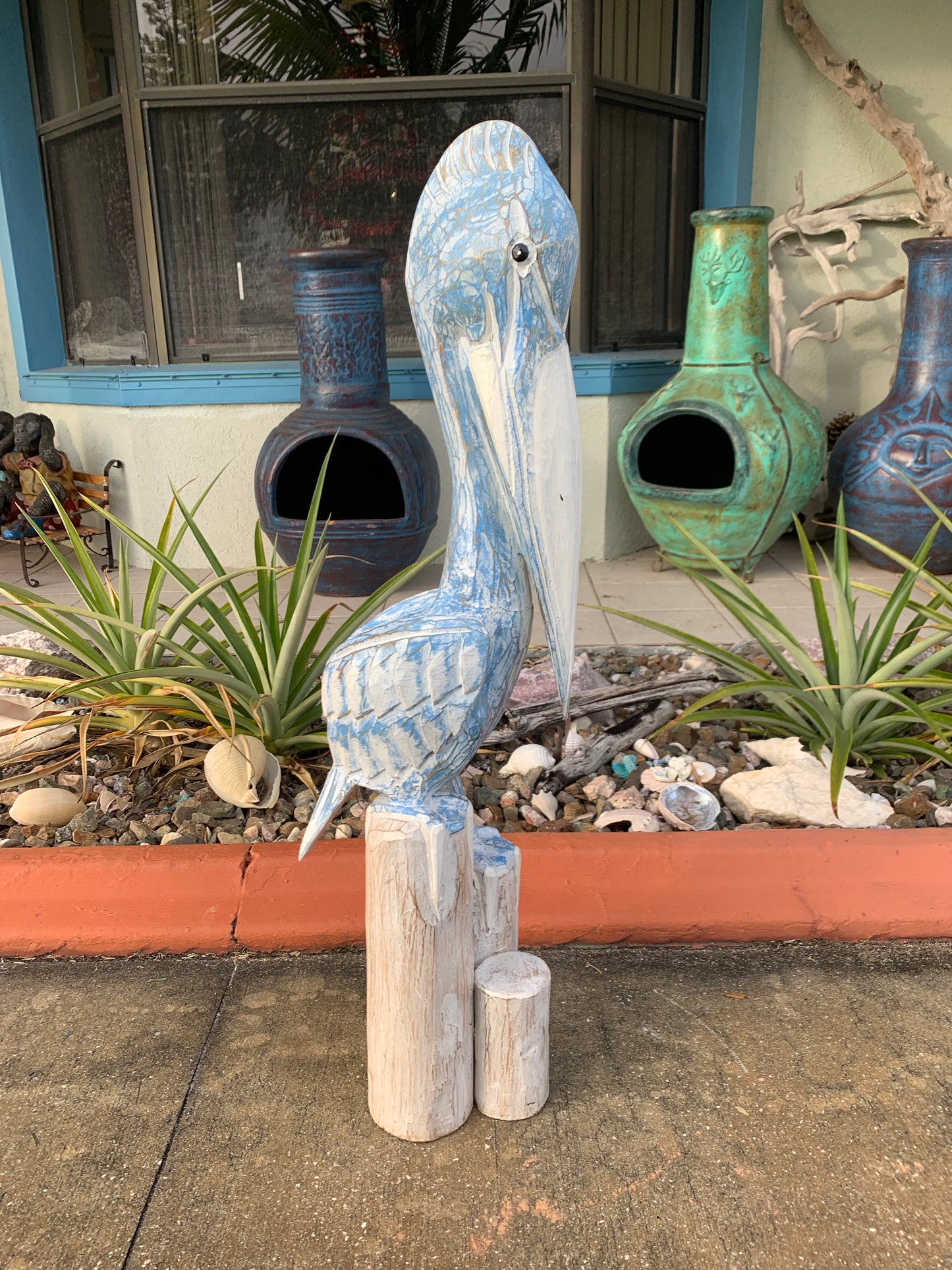 Carved Wooden Pelican Statue – Coastal Yard & Garden Decor