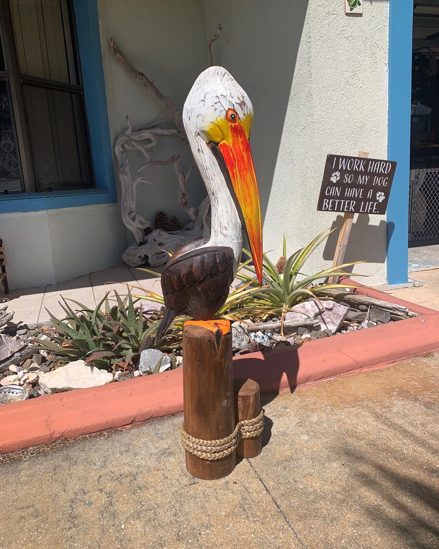Carved Wooden Pelican Statue – Coastal Yard & Garden Decor