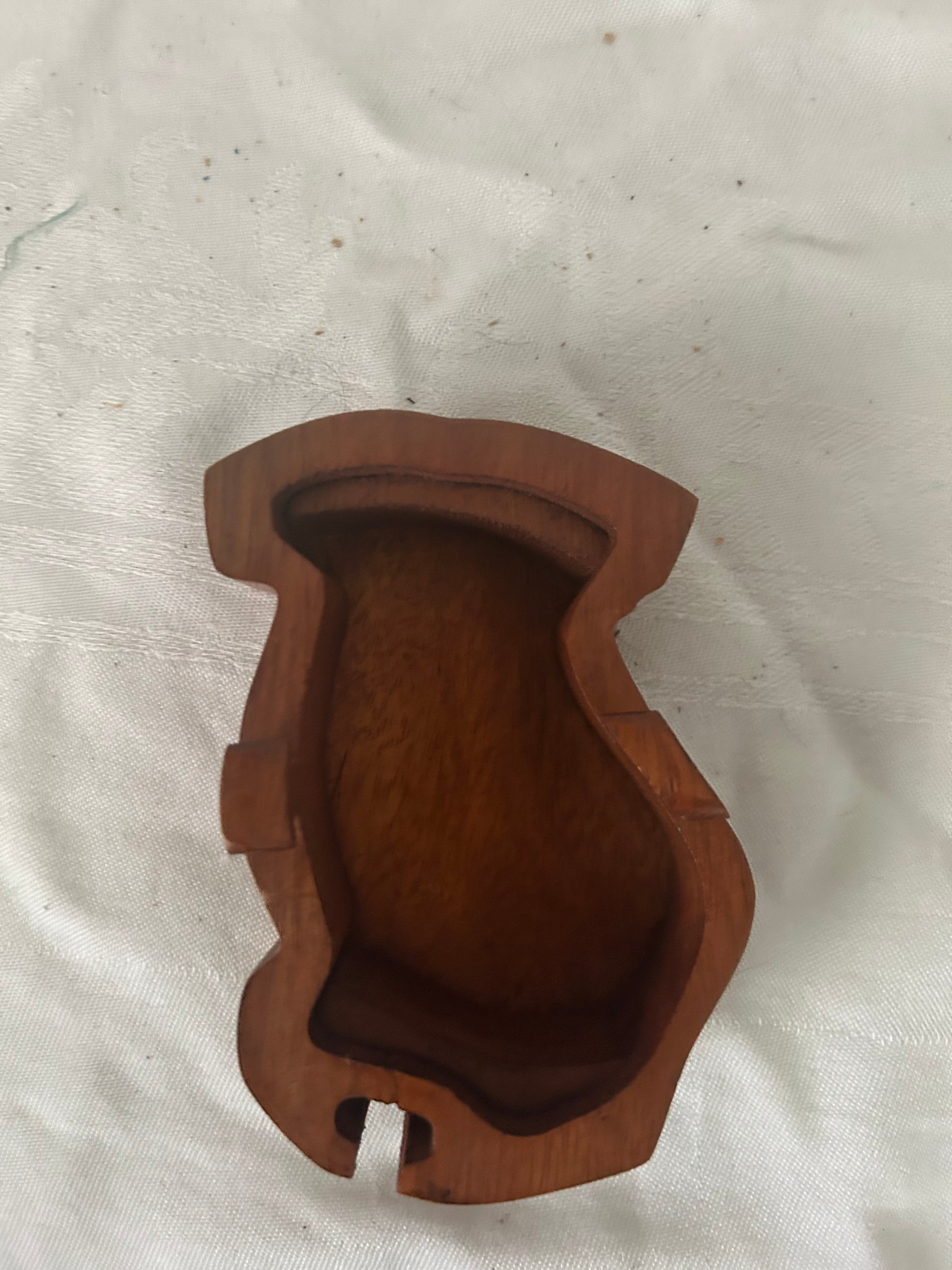 Inside the wooden dog puzzle box